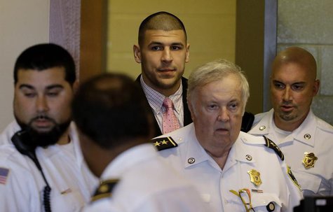 Former New England Patriots NFL football player, Aaron Hernandez, is brought into Bristol Superior Court before a hearing in Fall River, Mas Former New England Patriots NFL football player, Aaron Hernandez, is brought into Bristol Superior Court before a hearing in Fall River, Mas