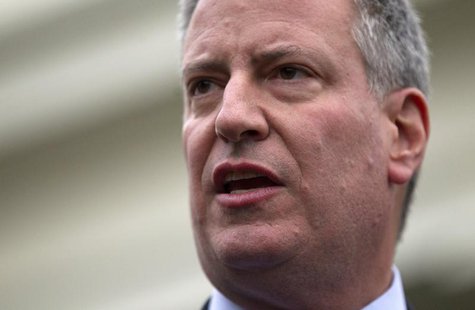 New York Mayor-elect Bill de Blasio speaks to the press outside the West Wing of the White House in Washington, December 13, 2013, following New York Mayor-elect Bill de Blasio speaks to the press outside the West Wing of the White House in Washington, December 13, 2013, following