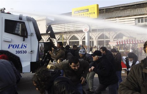 Riot police use water cannons against protesters during a demonstration against Turkey's ruling Ak Party (AKP) and Prime Minister Tayyip Erd Riot police use water cannons against protesters during a demonstration against Turkey's ruling Ak Party (AKP) and Prime Minister Tayyip Erd