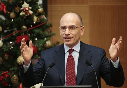 Italian Prime Minister Enrico Letta gestures as he holds a year end news conference in Rome December 23, 2013. REUTERS/Tony Gentile Italian Prime Minister Enrico Letta gestures as he holds a year end news conference in Rome December 23, 2013. REUTERS/Tony Gentile