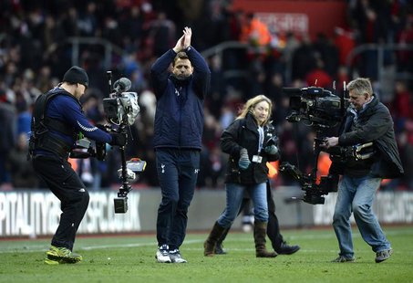 Tottenham Hotspur caretaker manager Tim Sherwood gestures to fans after winning their English Premier League soccer match against Southampto Tottenham Hotspur caretaker manager Tim Sherwood gestures to fans after winning their English Premier League soccer match against Southampto