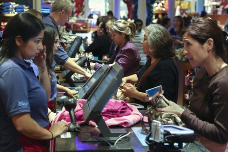 Black Friday customers make purchases at a Disney store at the Glendale Galleria in Glendale, California November 29, 2013. REUTERS/Jonathan Black Friday customers make purchases at a Disney store at the Glendale Galleria in Glendale, California November 29, 2013. REUTERS/Jonathan