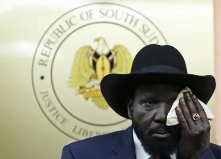South Sudan's President Salva Kiir wipes his face during a news conference in Juba December 18, 2013. REUTERS/Goran Tomasevic South Sudan's President Salva Kiir wipes his face during a news conference in Juba December 18, 2013. REUTERS/Goran Tomasevic