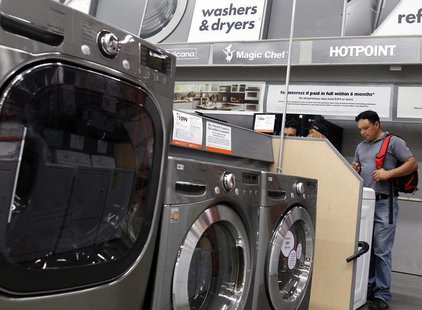 Shoppers look at washers and dryers at a Home Depot store in New York, July 29, 2010. REUTERS/Shannon Stapleton Shoppers look at washers and dryers at a Home Depot store in New York, July 29, 2010. REUTERS/Shannon Stapleton
