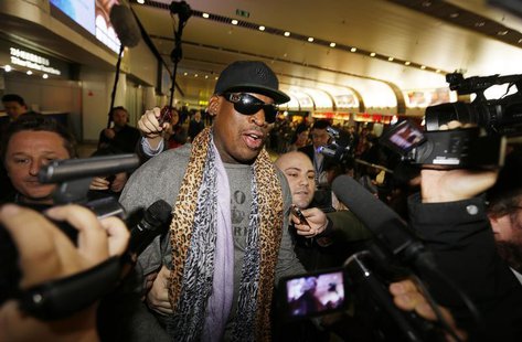 Former NBA basketball player Dennis Rodman speaks to the media after returning from his trip to North Korea at Beijing airport, December 23, Former NBA basketball player Dennis Rodman speaks to the media after returning from his trip to North Korea at Beijing airport, December 23,