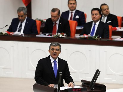 Turkey's President Abdullah Gul addresses the Turkish Parliament during a debate marking the reconvene of the parliament after a summer rece Turkey's President Abdullah Gul addresses the Turkish Parliament during a debate marking the reconvene of the parliament after a summer rece