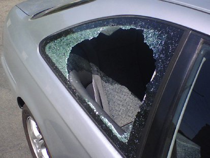A broken car window A broken car window