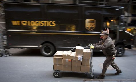 UPS delivery man Vinny Ambrosino prepares to deliver packages on Christmas Eve while wearing a Rudolf nose and antlers in New York, December UPS delivery man Vinny Ambrosino prepares to deliver packages on Christmas Eve while wearing a Rudolf nose and antlers in New York, December