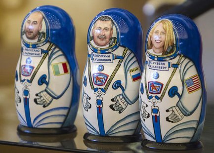 Matryoshka dolls, or Russian nesting dolls, depicting the International Space Station (ISS) crew members (L to R) Italian astronaut Luca Par Matryoshka dolls, or Russian nesting dolls, depicting the International Space Station (ISS) crew members (L to R) Italian astronaut Luca Par