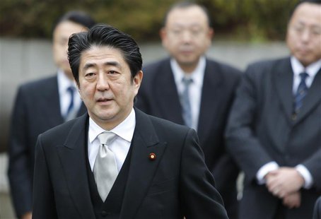 Japan's Prime Minister Shinzo Abe arrives at the controversial Yasukuni Shrine to pay tribute to the war dead, in Tokyo December 26, 2013. R Japan's Prime Minister Shinzo Abe arrives at the controversial Yasukuni Shrine to pay tribute to the war dead, in Tokyo December 26, 2013. R