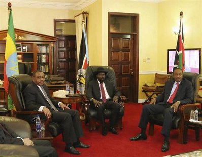 (L-R) Ethiopia's Prime Minister Hailemariam Desalegn, South Sudan President Salva Kiir and Kenya's President Uhuru Kenyatta meet in the capi (L-R) Ethiopia's Prime Minister Hailemariam Desalegn, South Sudan President Salva Kiir and Kenya's President Uhuru Kenyatta meet in the capi