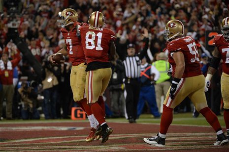 San Francisco, CA, USA; San Francisco 49ers quarterback Colin Kaepernick (7) celebrates after scoring a touchdown against the Atlanta Falcon San Francisco, CA, USA; San Francisco 49ers quarterback Colin Kaepernick (7) celebrates after scoring a touchdown against the Atlanta Falcon