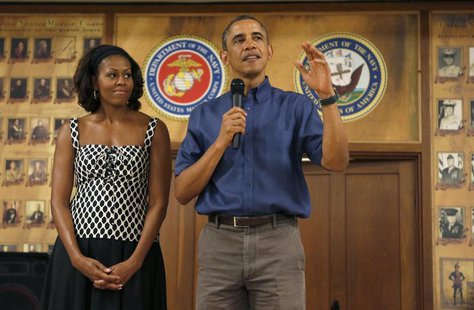 U.S. President Barack Obama and first lady Michelle Obama greet military personnel during a Christmas day visit to Marine Corps Base Hawaii U.S. President Barack Obama and first lady Michelle Obama greet military personnel during a Christmas day visit to Marine Corps Base Hawaii
