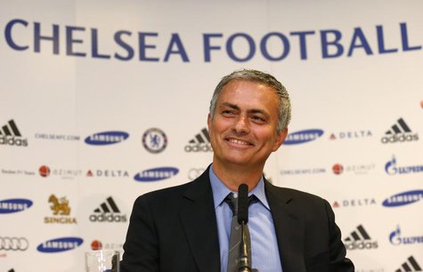 Newly reappointed Chelsea manager Jose Mourinho reacts during a news conference at Stamford Bridge stadium in London June 10, 2013. REUTERS/ Newly reappointed Chelsea manager Jose Mourinho reacts during a news conference at Stamford Bridge stadium in London June 10, 2013. REUTERS/