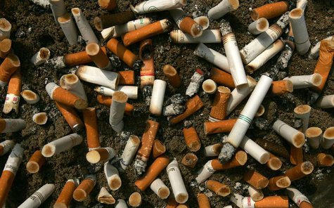 Cigarette butts fill an ashtray outside a construction site in Central, a business district in Hong Kong, October 18, 2006. REUTERS/Paul Yeu Cigarette butts fill an ashtray outside a construction site in Central, a business district in Hong Kong, October 18, 2006. REUTERS/Paul Yeu
