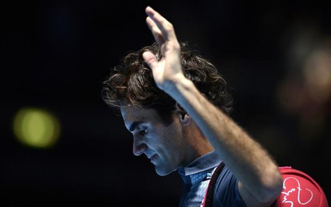 Roger Federer of Switzerland waves to the crowd after losing to Rafael Nadal of Spain in their men's singles semi-final tennis match at the Roger Federer of Switzerland waves to the crowd after losing to Rafael Nadal of Spain in their men's singles semi-final tennis match at the