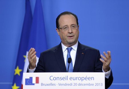 France's President Francois Hollande addresses a news conference during a European Union leaders summit in Brussels December 20, 2013. REUTE France's President Francois Hollande addresses a news conference during a European Union leaders summit in Brussels December 20, 2013. REUTE