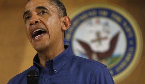 U.S. President Barack Obama speaks to military personnel during a Christmas day visit to Marine Corps Base Hawaii in Kaneohe, Hawaii Decembe U.S. President Barack Obama speaks to military personnel during a Christmas day visit to Marine Corps Base Hawaii in Kaneohe, Hawaii Decembe