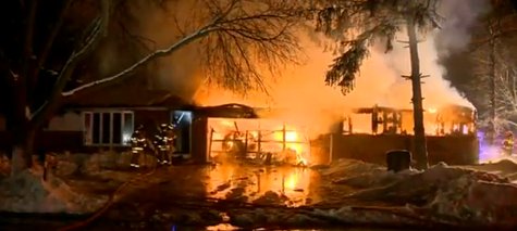 Fire destroys a duplex in Ashwaubenon on December 27, 2013. (Photo from: FOX 11/YouTube). Fire destroys a duplex in Ashwaubenon on December 27, 2013. (Photo from: FOX 11/YouTube).