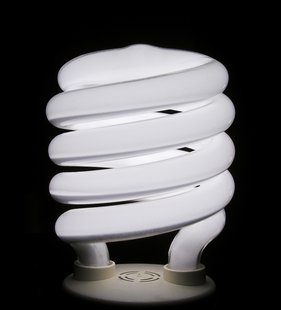 A compact fluorescent light bulb. A compact fluorescent light bulb.