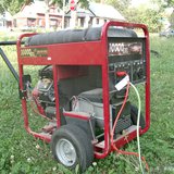 A portable electric generator. A portable electric generator.