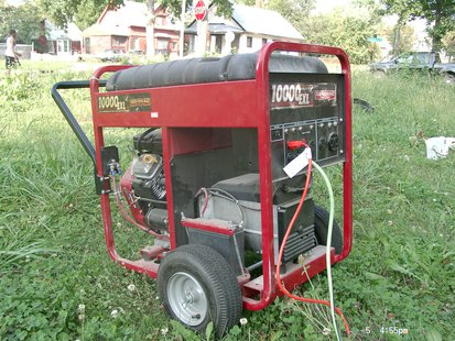 A portable electric generator. A portable electric generator.