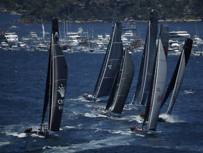 The field of yachts led by Wild Oats XI (2nd R) and Perpetual Loyal (L) sail out of Sydney Harbour at the start of the annual Sydney to Hoba The field of yachts led by Wild Oats XI (2nd R) and Perpetual Loyal (L) sail out of Sydney Harbour at the start of the annual Sydney to Hoba