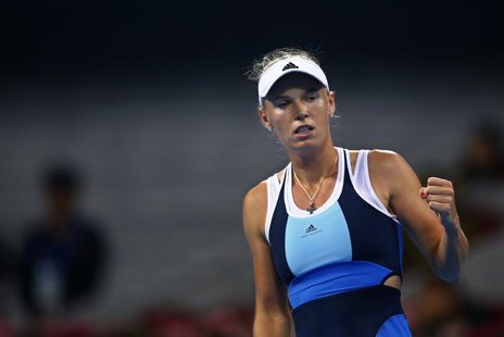 Caroline Wozniacki of Denmark pumps her fist after winning a point during her match against Sloane Stephens of the U.S. at the China Open te Caroline Wozniacki of Denmark pumps her fist after winning a point during her match against Sloane Stephens of the U.S. at the China Open te