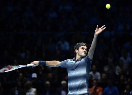 Roger Federer of Switzerland serves to Rafael Nadal of Spain during their men's singles semi-final tennis match at the ATP World Tour Finals Roger Federer of Switzerland serves to Rafael Nadal of Spain during their men's singles semi-final tennis match at the ATP World Tour Finals
