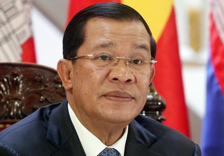 Cambodia's Prime Minister Hun Sen attends a signing ceremony at the Government Office in Hanoi December 26, 2013. REUTERS/Kham Cambodia's Prime Minister Hun Sen attends a signing ceremony at the Government Office in Hanoi December 26, 2013. REUTERS/Kham
