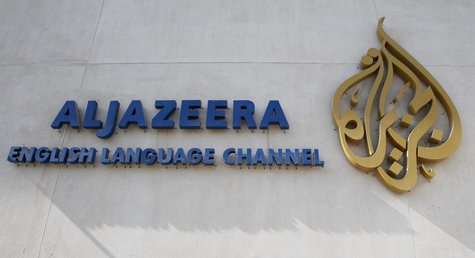 The logo of Qatar-based Al Jazeera satellite news channel is seen in Doha February 7, 2011. REUTERS/ Fadi Al-Assaad The logo of Qatar-based Al Jazeera satellite news channel is seen in Doha February 7, 2011. REUTERS/ Fadi Al-Assaad