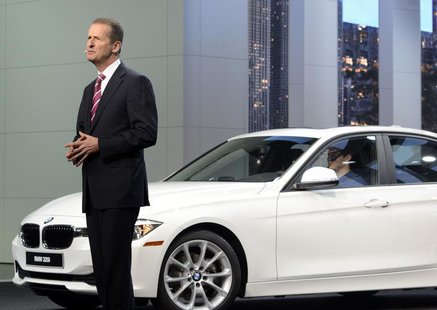 Dr. Herbert Diess, of the BMW Board of Management, speaks next to a 320i model at the North American International Auto Show in Detroit, Mic Dr. Herbert Diess, of the BMW Board of Management, speaks next to a 320i model at the North American International Auto Show in Detroit, Mic