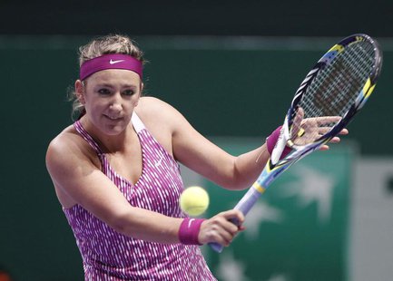 Victoria Azarenka of Belarus hits a return to Li Na of China during their WTA tennis championships match at Sinan Erdem Dome in Istanbul, Oc Victoria Azarenka of Belarus hits a return to Li Na of China during their WTA tennis championships match at Sinan Erdem Dome in Istanbul, Oc