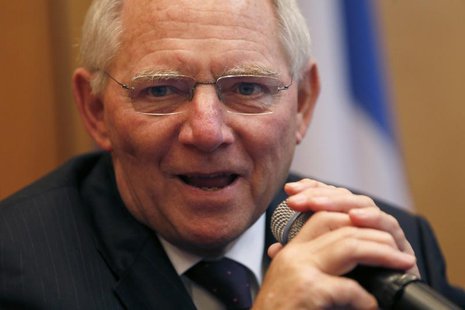 German's Finance Minister Wolfgang Schaeuble attends a news conference at the Bercy Finance Ministry in Paris December 19, 2013. REUTERS/Cha German's Finance Minister Wolfgang Schaeuble attends a news conference at the Bercy Finance Ministry in Paris December 19, 2013. REUTERS/Cha