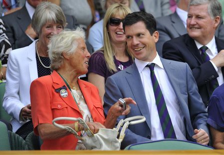 Former British tennis players Anne Jones (L) and Tim Henman talk on Centre Court at the 2010 Wimbledon tennis championships in London, June Former British tennis players Anne Jones (L) and Tim Henman talk on Centre Court at the 2010 Wimbledon tennis championships in London, June