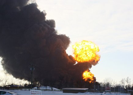 Flames rise from a train derailment in Casselton, North Dakota on December 30th, 2013 Northeast of the explosion on highway 10. Flames rise from a train derailment in Casselton, North Dakota on December 30th, 2013 Northeast of the explosion on highway 10.