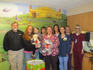 (l-r) Dan Weaver, Kristen VanLue, and Mayson VanLue from AJ's Butler Store , and CHC Pediatric Staff (l-r) Dan Weaver, Kristen VanLue, and Mayson VanLue from AJ's Butler Store , and CHC Pediatric Staff