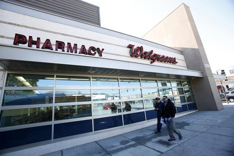 People walk by a Walgreens store in Pasadena, California December 20, 2013. REUTERS/Mario Anzuoni People walk by a Walgreens store in Pasadena, California December 20, 2013. REUTERS/Mario Anzuoni