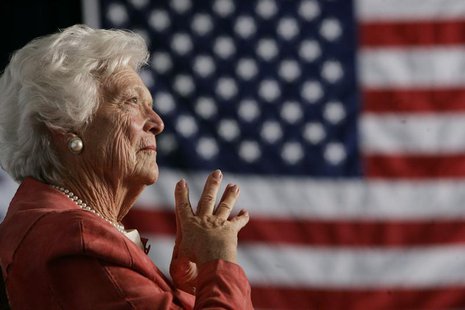 Former U.S. first lady Barbara Bush listens to her son, President George W. Bush, as he speaks at an event on social security reform in Orla Former U.S. first lady Barbara Bush listens to her son, President George W. Bush, as he speaks at an event on social security reform in Orla
