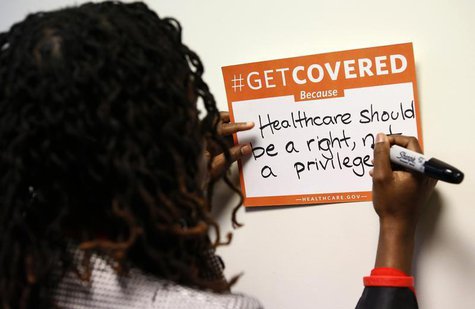 A woman fills out her thoughts on the Affordable Care Act at the White House Youth Summit on the Affordable Care Act in Washington December A woman fills out her thoughts on the Affordable Care Act at the White House Youth Summit on the Affordable Care Act in Washington December