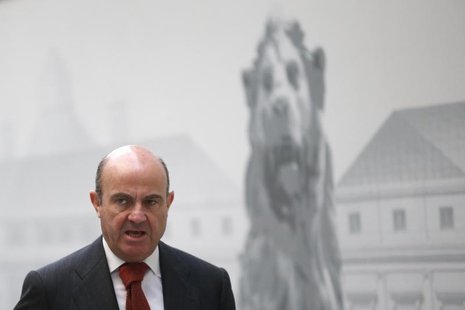 Spain's Economy Minister Luis de Guindos arrives at the Parliament to attend the weekly government control session in Madrid October 30, 201 Spain's Economy Minister Luis de Guindos arrives at the Parliament to attend the weekly government control session in Madrid October 30, 201