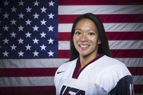 Olympic hockey player Julie Chu poses for a portrait during the 2013 U.S. Olympic Team Media Summit in Park City, Utah October 2, 2013. REUT Olympic hockey player Julie Chu poses for a portrait during the 2013 U.S. Olympic Team Media Summit in Park City, Utah October 2, 2013. REUT