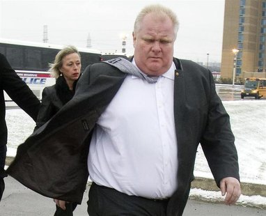 Toronto mayor Rob Ford arrives with his wife Renata at the public memorial for police constable John Zivcic in Toronto December 9, 2013. REU Toronto mayor Rob Ford arrives with his wife Renata at the public memorial for police constable John Zivcic in Toronto December 9, 2013. REU