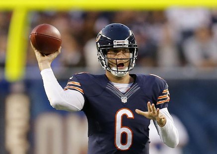Chicago Bears' Jay Cutler makes a pass against the San Diego Chargers during the first half of a pre-season NFL football game in Chicago, Il Chicago Bears' Jay Cutler makes a pass against the San Diego Chargers during the first half of a pre-season NFL football game in Chicago, Il