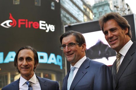 FireEye Inc. Chairman of the Board, David DeWalt (R) and Founder Ashar Aziz (L) pose with Nasdaq CEO Robert Greifeld outside the Nasdaq Mark FireEye Inc. Chairman of the Board, David DeWalt (R) and Founder Ashar Aziz (L) pose with Nasdaq CEO Robert Greifeld outside the Nasdaq Mark