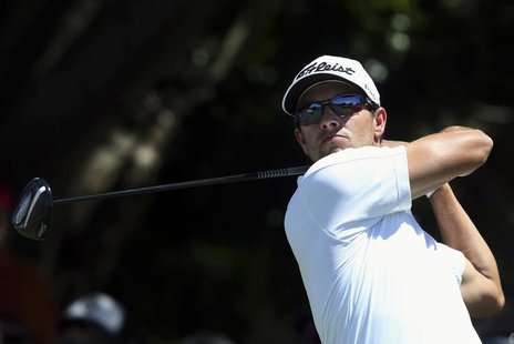 Australia's Adam Scott hits on the tenth hole during the fourth round of the Australian Open golf tournament at Royal Sydney Golf Club Decem Australia's Adam Scott hits on the tenth hole during the fourth round of the Australian Open golf tournament at Royal Sydney Golf Club Decem