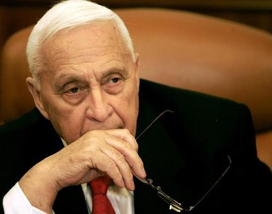 Israeli Prime Minister Ariel Sharon attends a ceremony completing the sale of Bank Leumi to a private U.S. investment group in his office in Israeli Prime Minister Ariel Sharon attends a ceremony completing the sale of Bank Leumi to a private U.S. investment group in his office in