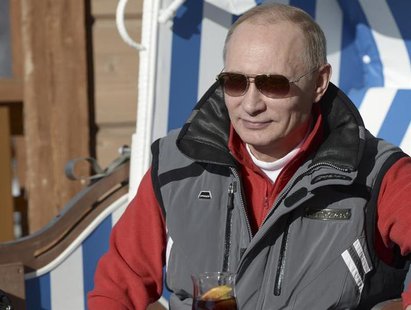 Russian President Vladimir Putin looks on during his visit to the "Laura" cross country ski and biathlon centre in the resort of Krasnaya Po Russian President Vladimir Putin looks on during his visit to the "Laura" cross country ski and biathlon centre in the resort of Krasnaya Po