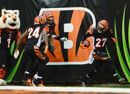 Cincinnati Bengals cornerback Dre Kirkpatrick (27) celebrates with teammates after intercepting a pass and running for a touchdown during th Cincinnati Bengals cornerback Dre Kirkpatrick (27) celebrates with teammates after intercepting a pass and running for a touchdown during th