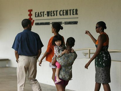 U.S. President Barack Obama and the First Family leave an exhibit about his mother's work in Indonesia at the East West Center at the Univer U.S. President Barack Obama and the First Family leave an exhibit about his mother's work in Indonesia at the East West Center at the Univer
